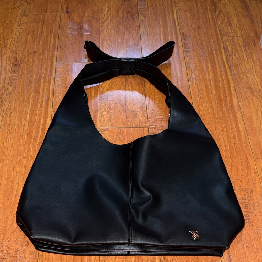 Victoria’s Secret black leather bag. Brand new, never used.